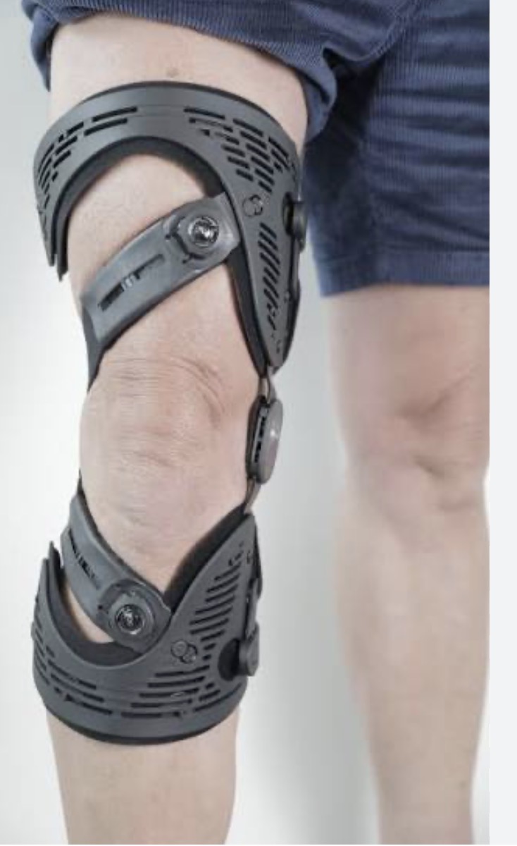 Offloader knee brace designed to shift weight away from the damaged knee compartment